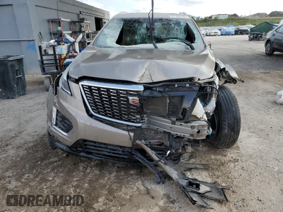 2022 Cadillac XT5 FWD Premium Luxury z VIN 1GYKNCRS4NZ179429, wystawiony jako Copart lot #47180195 z przebiegiem 45 649 mil mil oraz Nie do naprawy • Non repairable. Historia ofert i sprzedaży dostępna na DreamBid. Obrazek 5.