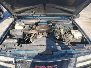 1994 GMC Suburban z VIN 1GKFK16K4RJ754534, wystawiony jako Copart lot #56044145 z przebiegiem 224 747 mil mil oraz Nie do naprawy • Non repairable. Historia ofert i sprzedaży dostępna na DreamBid. Obrazek 11.