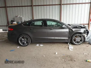 2015 Ford Fusion Titanium with VIN 3FA6P0K97FR244227, listed as a IAAI auction lot 41625135 with 119,313 mi miles. Bid and sale history available at carsss.com. Image 13.