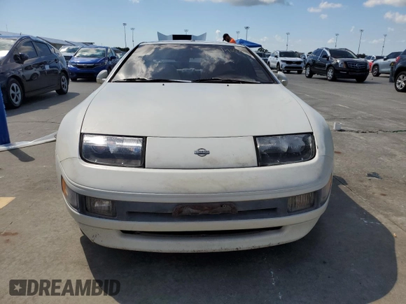 1991 Nissan 300ZX z VIN JN1RZ26H3MX504127, wystawiony jako Copart lot #74052424 z przebiegiem 48 904 mil mil oraz Szkody całkowita. Historia ofert i sprzedaży dostępna na DreamBid. Obrazek 5.