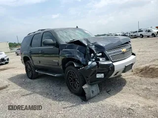 2013 Chevrolet Tahoe LT with VIN 1GNSKBE0XDR132697, listed as a Copart auction lot 57252575 with 166,956 mi miles and Salvage title. Bid and sale history available at DreamBid. Image 14.