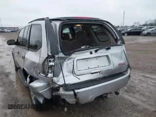 2006 GMC Envoy SLT with VIN 1GKDT13SX62342147, listed as a IAAI auction lot 40873738 with 159,092 mi miles. Bid and sale history available at carsss.com. Image 6.