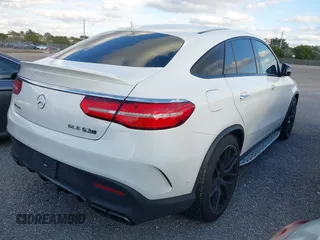2018 Mercedes-Benz GLE 63 S AMG with VIN 4JGED7FB3JA099383, listed as a IAAI auction lot 41215972 with 44,057 mi miles and . Bid and sale history available at DreamBid. Image 4.