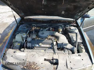 1992 Cadillac Seville z VIN 1G6KS53B4NU818363, wystawiony jako IAAI lot #42357836 z przebiegiem 91 439 mil mil oraz . Historia ofert i sprzedaży dostępna na DreamBid. Obrazek 10.