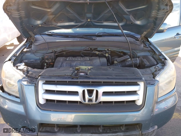2007 Honda Pilot EX-L with VIN 5FNYF285X7B045780, listed as a IAAI auction lot 41324224 with 168,911 mi miles. Bid and sale history available at carsss.com. Image 10.