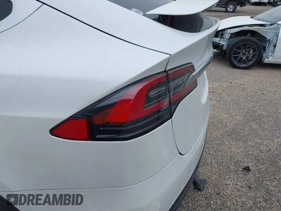 2020 Tesla Model X Long Range with VIN 5YJXCDE2XLF284847, listed as a IAAI auction lot 41595151 with 29,466 mi miles. Bid and sale history available at carsss.com. Image 23.