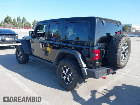 2021 Jeep Wrangler Unlimited Rubicon with VIN 1C4JJXFM5MW722572, listed as a IAAI auction lot 41667167 with Not provided miles and . Bid and sale history available at DreamBid. Image 3.