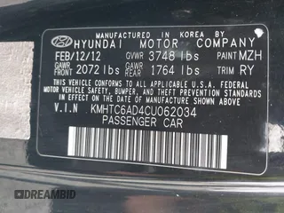 2012 Hyundai Veloster w/Gray Int with VIN KMHTC6AD4CU062034, listed as a IAAI auction lot 42371790 with 116,861 mi miles and . Bid and sale history available at DreamBid. Image 9.