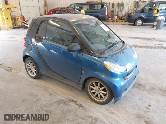 2009 Smart fortwo Pure with VIN WMEEJ31X89K228315, listed as a IAAI auction lot 42662931 with 60,666 mi miles and . Bid and sale history available at DreamBid. Image 1.
