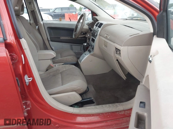 2009 Dodge Caliber SXT z VIN 1B3HB48A69D168427, wystawiony jako IAAI lot #42156117 z przebiegiem 168 286 mil mil oraz . Historia ofert i sprzedaży dostępna na DreamBid. Obrazek 5.