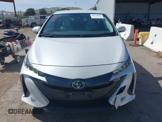 2021 Toyota Prius LE with VIN JTDKAMFP2M3177459, listed as a IAAI auction lot 42093828 with 65,501 mi miles and . Bid and sale history available at DreamBid. Image 12.