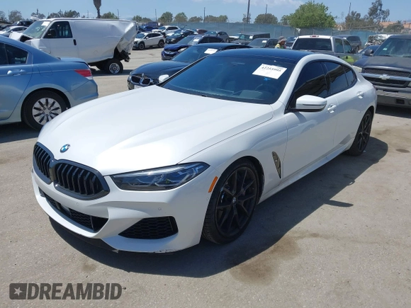 2022 BMW 8 Series M850i z VIN WBAGV8C02NCH87808, wystawiony jako IAAI lot #42255995 z przebiegiem 34 285 mil mil oraz . Historia ofert i sprzedaży dostępna na DreamBid. Obrazek 18.