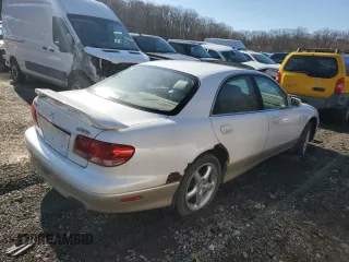2002 Mazda Millenia S z VIN JM1TA222521733260, wystawiony jako Copart lot #49984755 z przebiegiem 140 212 mil mil oraz Szkoda całkowita • Salvage title. Historia ofert i sprzedaży dostępna na DreamBid. Obrazek 3.
