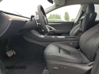 2023 Tesla Model Y Long Range z VIN 7SAYGDEE3PF751019, wystawiony jako Copart lot #57972885 z przebiegiem 24 591 mil mil oraz Szkoda całkowita • Salvage title. Historia ofert i sprzedaży dostępna na DreamBid. Obrazek 7.