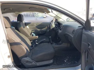 2010 Hyundai Accent GS with VIN KMHCM3AC2AU164786, listed as a IAAI auction lot 41995191 with 148,174 mi miles. Bid and sale history available at carsss.com. Image 5.