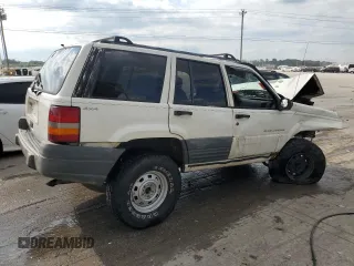 1996 Jeep Grand Cherokee Laredo with VIN 1J4GZ58S9TC277492, listed as a Copart auction lot 66732404 with Not provided miles and Salvage title. Bid and sale history available at DreamBid. Image 3.