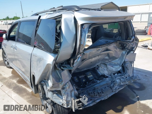 2015 Toyota Sienna SE with VIN 5TDXK3DC7FS684341, listed as a IAAI auction lot 41959077 with 154,377 mi miles and . Bid and sale history available at DreamBid. Image 6.