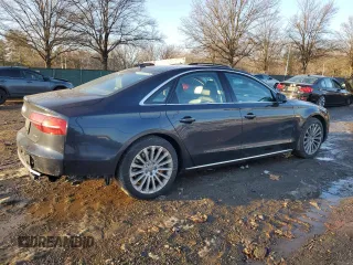 2015 Audi A8 z VIN WAUJGAFD4FN028750, wystawiony jako Copart lot #89099265 z przebiegiem 44 149 mil mil oraz Szkoda całkowita • Salvage title. Historia ofert i sprzedaży dostępna na DreamBid. Obrazek 3.