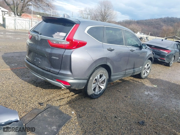 2019 Honda CR-V LX with VIN 5J6RW6H34KL005317, listed as a IAAI auction lot 41225711 with 59,166 mi miles. Bid and sale history available at carsss.com. Image 4.