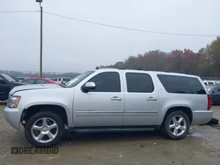 2014 Chevrolet Suburban LTZ with VIN 1GNSCKE05ER173446, listed as a IAAI auction lot 41047096 with 189,049 mi miles and . Bid and sale history available at DreamBid. Image 15.