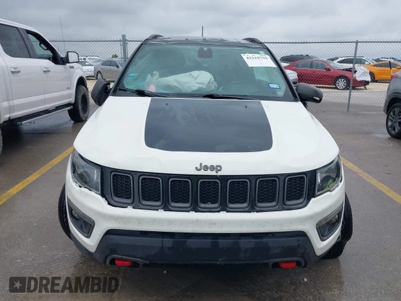 2020 Jeep Compass Trailhawk z VIN 3C4NJDDB6LT126585, wystawiony jako IAAI lot #42210794 z przebiegiem 132 220 mil mil oraz . Historia ofert i sprzedaży dostępna na DreamBid. Obrazek 12.