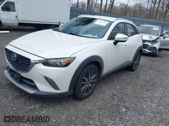 2018 Mazda CX-3 Touring with VIN JM1DKFC71J0315074, listed as a IAAI auction lot 42029790 with 100,268 mi miles. Bid and sale history available at carsss.com. Image 17.