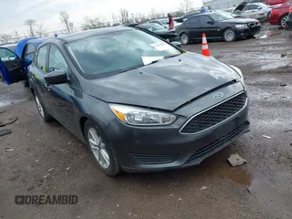 2018 Ford Focus SE with VIN 1FADP3F23JL280042, listed as a IAAI auction lot 41905008 with 80,797 mi miles. Bid and sale history available at carsss.com. Image 1.