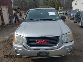 2004 GMC Envoy SLE with VIN 1GKDS13S442350938, listed as a IAAI auction lot 41790810 with 161,998 mi miles. Bid and sale history available at carsss.com. Image 6.