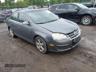 2009 Volkswagen Jetta SE z VIN 3VWRM71K19M049963, wystawiony jako IAAI lot #42279906 z przebiegiem 157 290 mil mil oraz . Historia ofert i sprzedaży dostępna na DreamBid. Obrazek 1.
