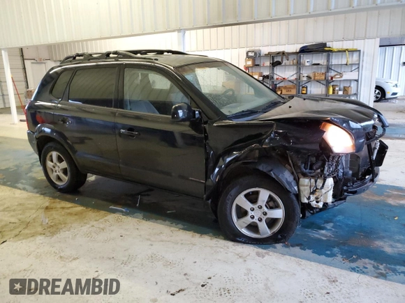 2005 Hyundai Tucson GL with VIN KM8JM12BX5U205060, listed as a Copart auction lot 71282644 with 243,076 mi miles and Salvage Title. Bid and sale history available at carsss.com. Image 4.