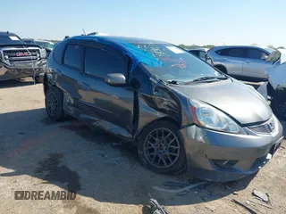 2011 Honda Fit Sport z VIN JHMGE8H64BC022557, wystawiony jako IAAI lot #41976923 z przebiegiem 157 316 mil mil oraz . Historia ofert i sprzedaży dostępna na DreamBid. Obrazek 1.