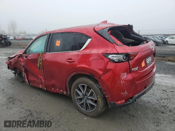 2018 Mazda CX-5 Grand Touring with VIN JM3KFBDM2J0432713, listed as a Copart auction lot 88693565 with 0 mi miles and Salvage Title. Bid and sale history available at carsss.com. Image 2.