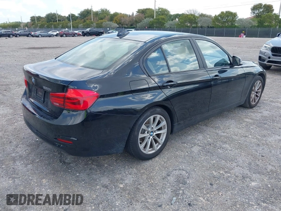 2018 BMW 3 Series 320i with VIN WBA8E1G57JNU88781, listed as a IAAI auction lot 42019246 with 56,820 mi miles. Bid and sale history available at carsss.com. Image 4.