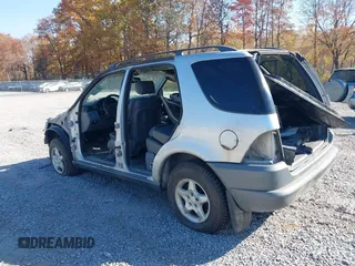 1999 Mercedes-Benz M 320/430/500 with VIN 4JGAB54E5XA086715, listed as a IAAI auction lot 41546385 with 188,551 mi miles and . Bid and sale history available at DreamBid. Image 3.