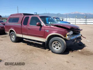 1999 Ford F-150 XL z VIN 1FTRX18LXXNB23891, wystawiony jako Copart lot #61445645 z przebiegiem 179 410 mil mil oraz Szkoda całkowita • Salvage title. Historia ofert i sprzedaży dostępna na DreamBid. Obrazek 4.