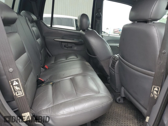 2001 Ford Explorer Sport Trac with VIN 1FMZU67E11UB01604, listed as a Copart auction lot 57581825 with 211,905 mi miles and Salvage title. Bid and sale history available at DreamBid. Image 10.
