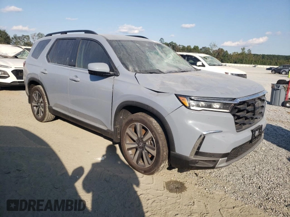 2024 Honda Pilot Touring with VIN 5FNYG2H70RB015463, listed as a Copart auction lot 73832964 with 14,606 mi miles and Salvage title. Bid and sale history available at DreamBid. Image 4.