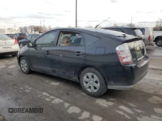 2005 Toyota Prius z VIN JTDKB20U653052272, wystawiony jako Copart lot #52339475 z przebiegiem 299 999 mil mil oraz Nie do naprawy • Non repairable. Historia ofert i sprzedaży dostępna na DreamBid. Obrazek 2.