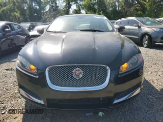 2015 Jaguar XF V6 Portfolio with VIN SAJWJ0FFXF8U60040, listed as a Copart auction lot 52912695 with 112,618 mi miles and Salvage Title. Bid and sale history available at carsss.com. Image 5.