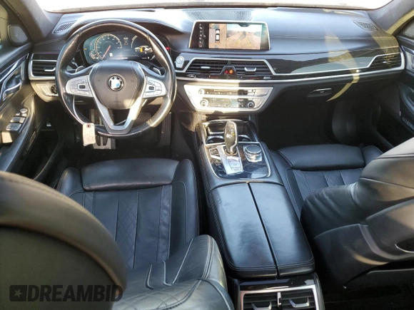 2016 BMW 7 Series 750i with VIN WBA7F0C5XGGL99048, listed as a Copart auction lot 84815364 with 96,743 mi miles and Salvage Title. Bid and sale history available at carsss.com. Image 8.