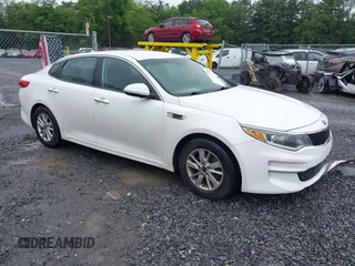 2016 Kia Optima LX with VIN KNAGT4L32G5073769, listed as a IAAI auction lot 42512184 with 111,977 mi miles and . Bid and sale history available at DreamBid. Image 1.