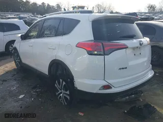 2017 Toyota RAV4 LE with VIN JTMZFREV8HJ721753, listed as a IAAI auction lot 41286036 with 119,246 mi miles. Bid and sale history available at carsss.com. Image 3.