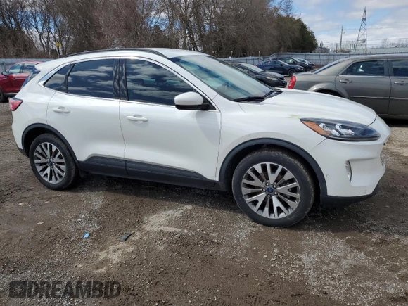 2021 Ford Escape Titanium Hybrid с VIN 1FMCU9DZ5MUA23637, выставлен на аукционе Copart как лот 51991185 с пробегом 101 012 миль миль и Чистый • Clean title. История ставок и продаж доступна на DreamBid. Изображение 4.