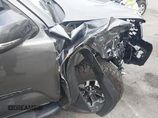 2021 Toyota Tacoma SR z VIN 3TMCZ5AN9MM397611, wystawiony jako IAAI lot #41467705 z przebiegiem 65 191 mil mil oraz . Historia ofert i sprzedaży dostępna na DreamBid. Obrazek 6.