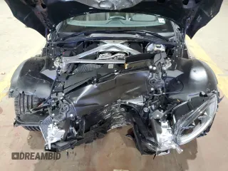 2021 Aston Martin Vantage z VIN SCFSMGBW2MGP05338, wystawiony jako Copart lot #80123274 z przebiegiem Nie podano mil oraz Szkody całkowita. Historia ofert i sprzedaży dostępna na DreamBid. Obrazek 13.