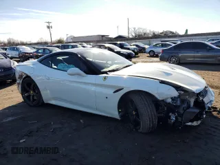 2016 Ferrari California T z VIN ZFF77XJA2G0213103, wystawiony jako Copart lot #43268564 z przebiegiem 12 200 mil mil oraz Szkody całkowita. Historia ofert i sprzedaży dostępna na DreamBid. Obrazek 4.
