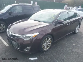 2014 Toyota Avalon Limited with VIN 4T1BK1EB2EU098415, listed as a IAAI auction lot 41747184 with 230,571 mi miles. Bid and sale history available at carsss.com. Image 2.