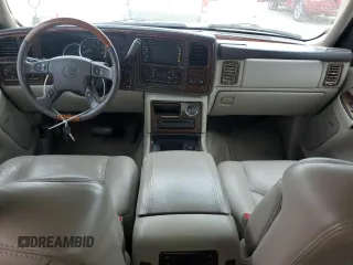 2003 Cadillac Escalade z VIN 1GYEK63N73R277166, wystawiony jako Copart lot #51797955 z przebiegiem 374 735 mil mil oraz Czysty tytuł • Clean title. Historia ofert i sprzedaży dostępna na DreamBid. Obrazek 8.