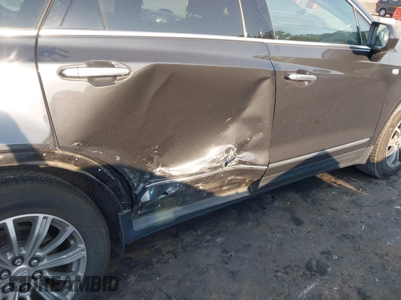 2019 Cadillac XT5 Luxury FWD z VIN 1GYKNCRS2KZ251207, wystawiony jako IAAI lot #42066271 z przebiegiem 128 226 mil mil oraz . Historia ofert i sprzedaży dostępna na DreamBid. Obrazek 6.
