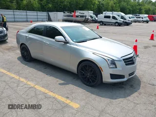 2014 Cadillac ATS Standard AWD z VIN 1G6AG5RX7E0127075, wystawiony jako IAAI lot #42457522 z przebiegiem 153 921 mil mil oraz . Historia ofert i sprzedaży dostępna na DreamBid. Obrazek 1.